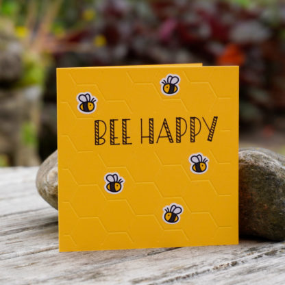 gelbe Karte mit Bee Happy aufschrift